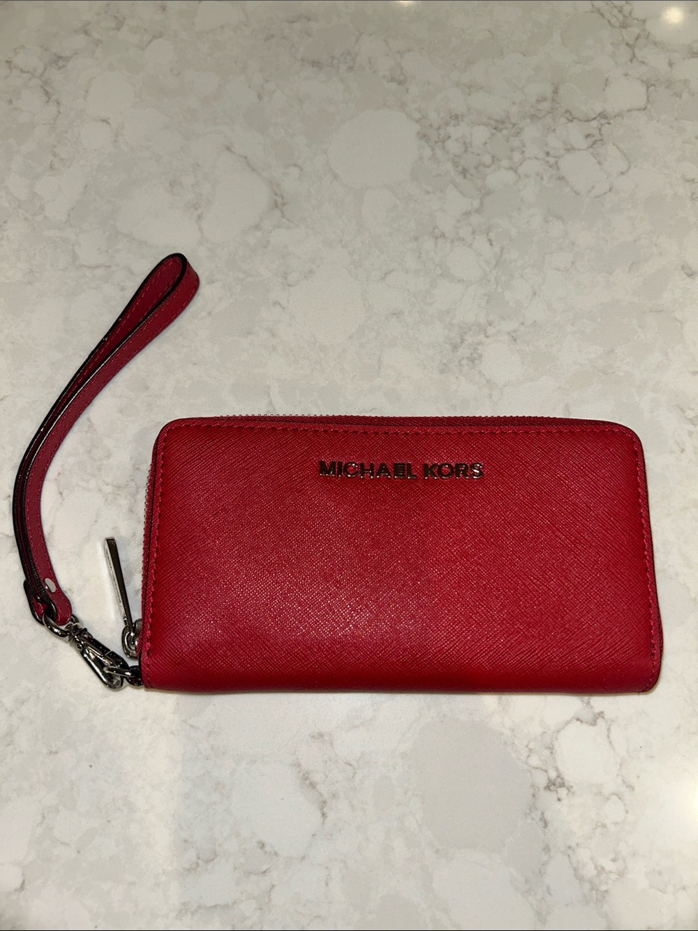 Michael Kors red crossgrain leather zip around wallet wristlet